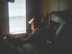 While masturbating on the cam concealed in the bedroom, the crazy wife acts filthy.